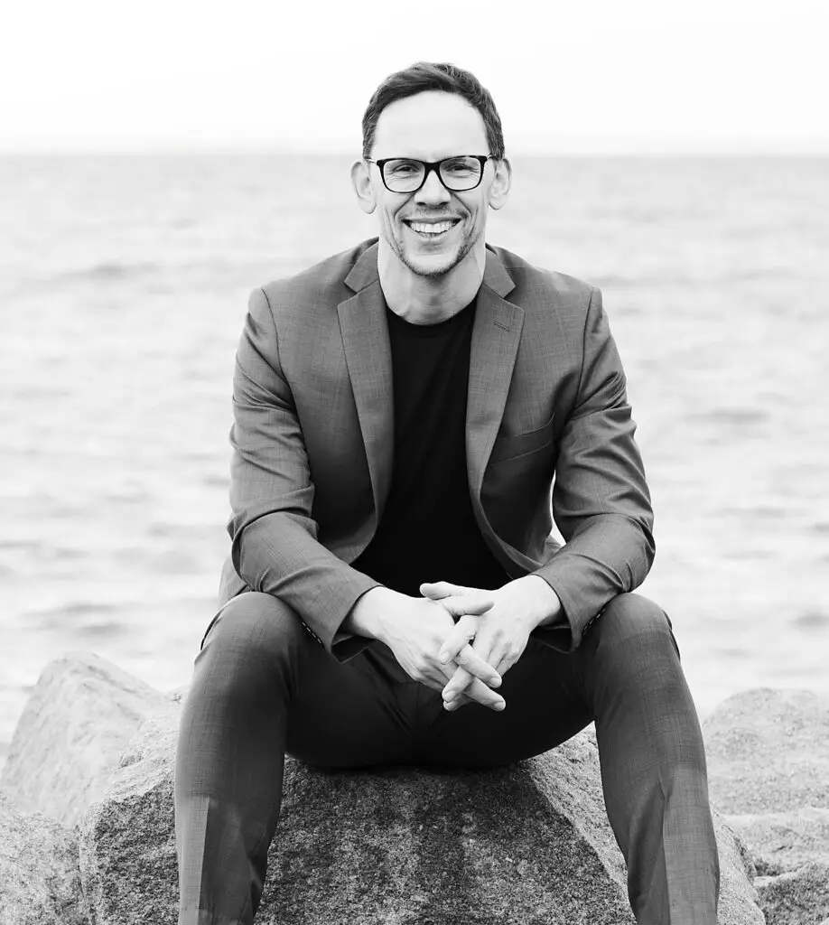 James Cooper BTX founder and head personal trainer in professional attire outdoors